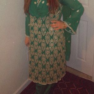 Green Pakistani suit with bead detailing